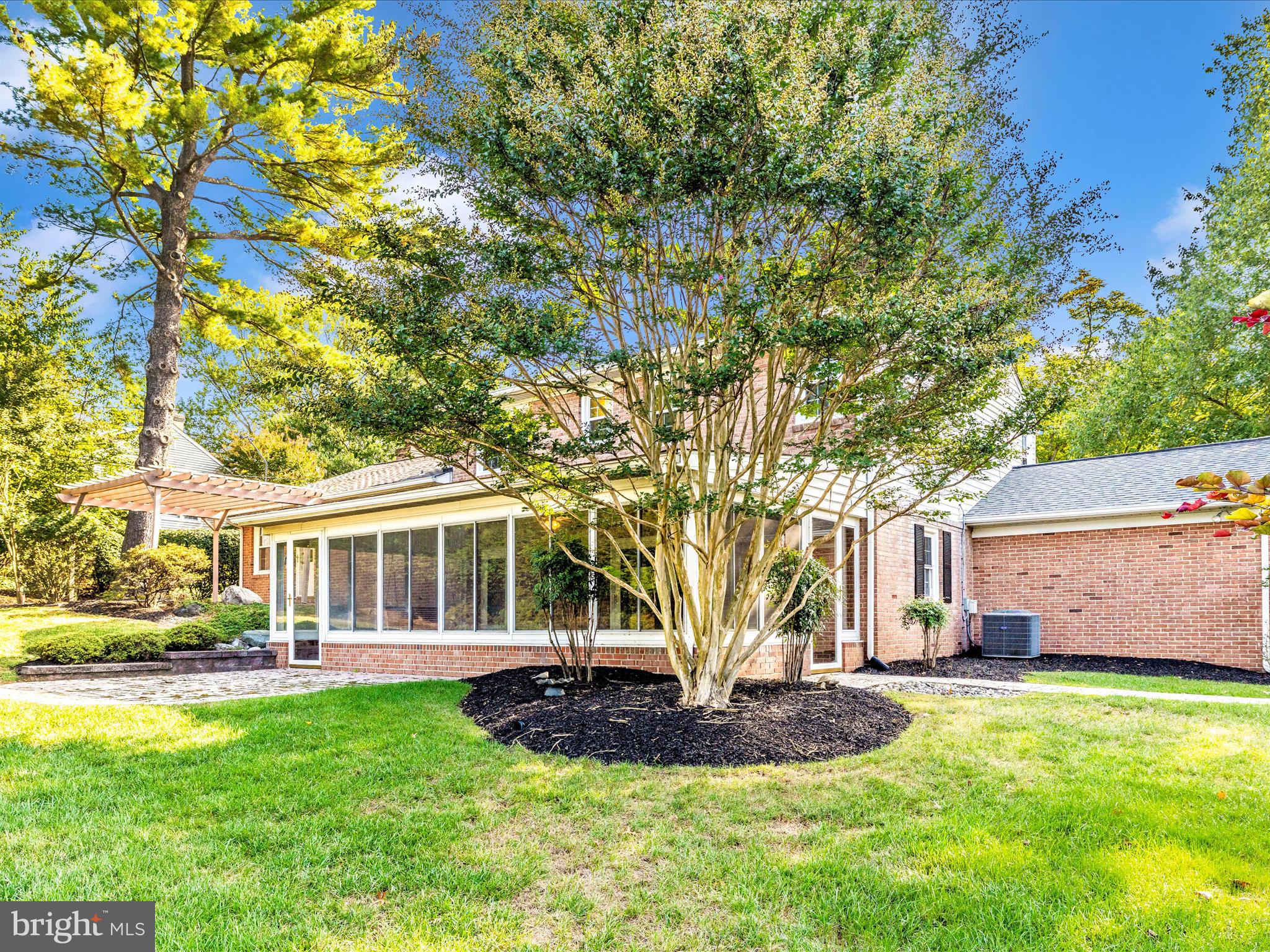 3930 Chatham Road Ellicott City, MD 21042 - Photo 45 of 51 a front view of a house with a yard