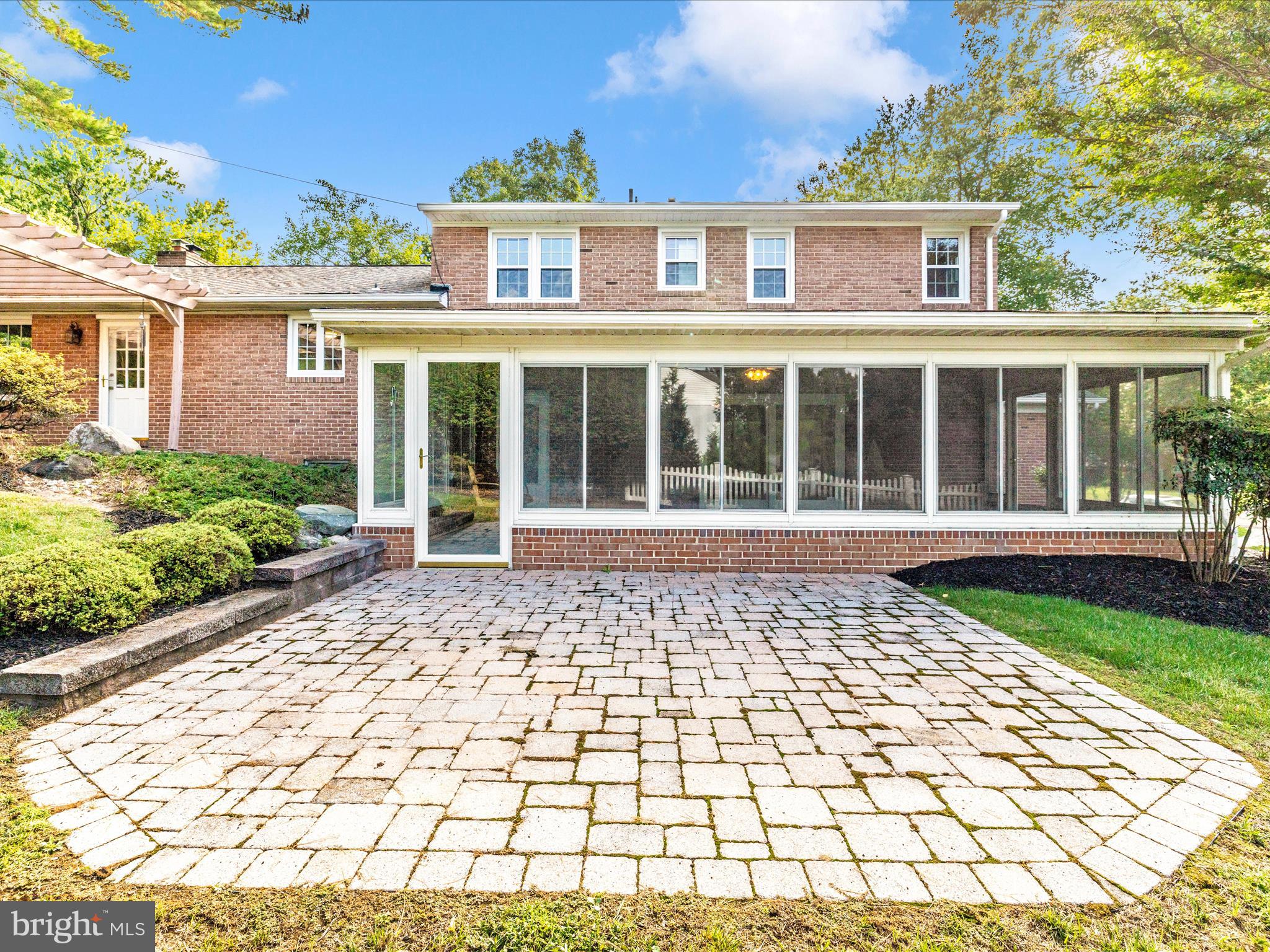 3930 Chatham Road Ellicott City, MD 21042 - Photo 51 of 51 front view of a brick house with a large window