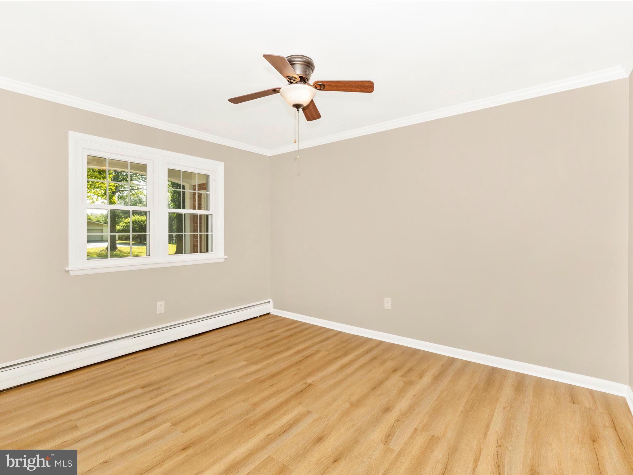 3930 Chatham Road Ellicott City, MD 21042 - Photo 9 of 51 wooden floor in an empty room with a window