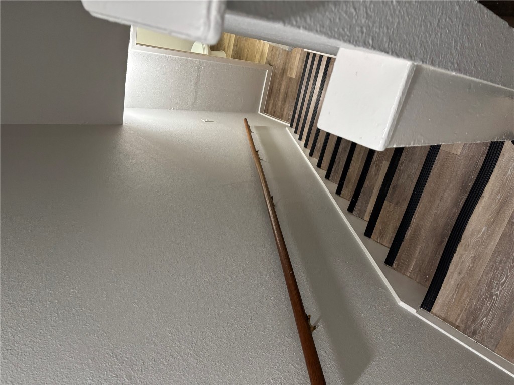 1210 Southport Drive, Unit A Austin, TX 78704 - Photo 12 of 15 a view of staircase with wooden floor
