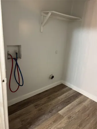 a view of a room with rack on the wall