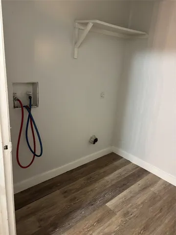 a view of a room with rack on the wall