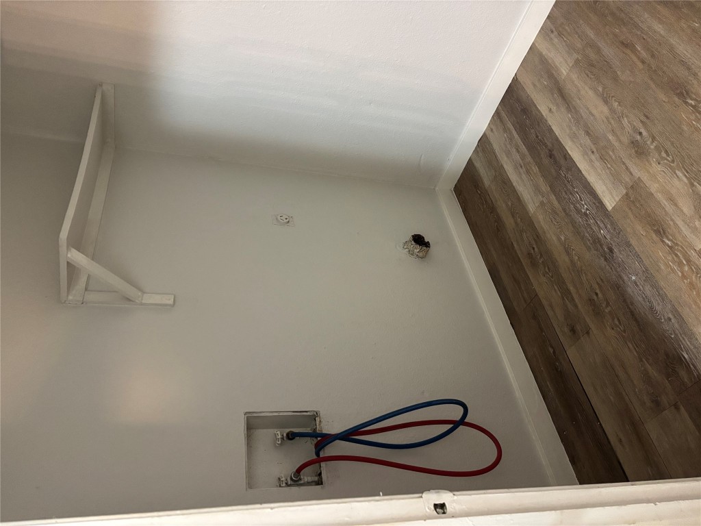 1210 Southport Drive, Unit A Austin, TX 78704 - Photo 13 of 15 a view of a room with rack on the wall