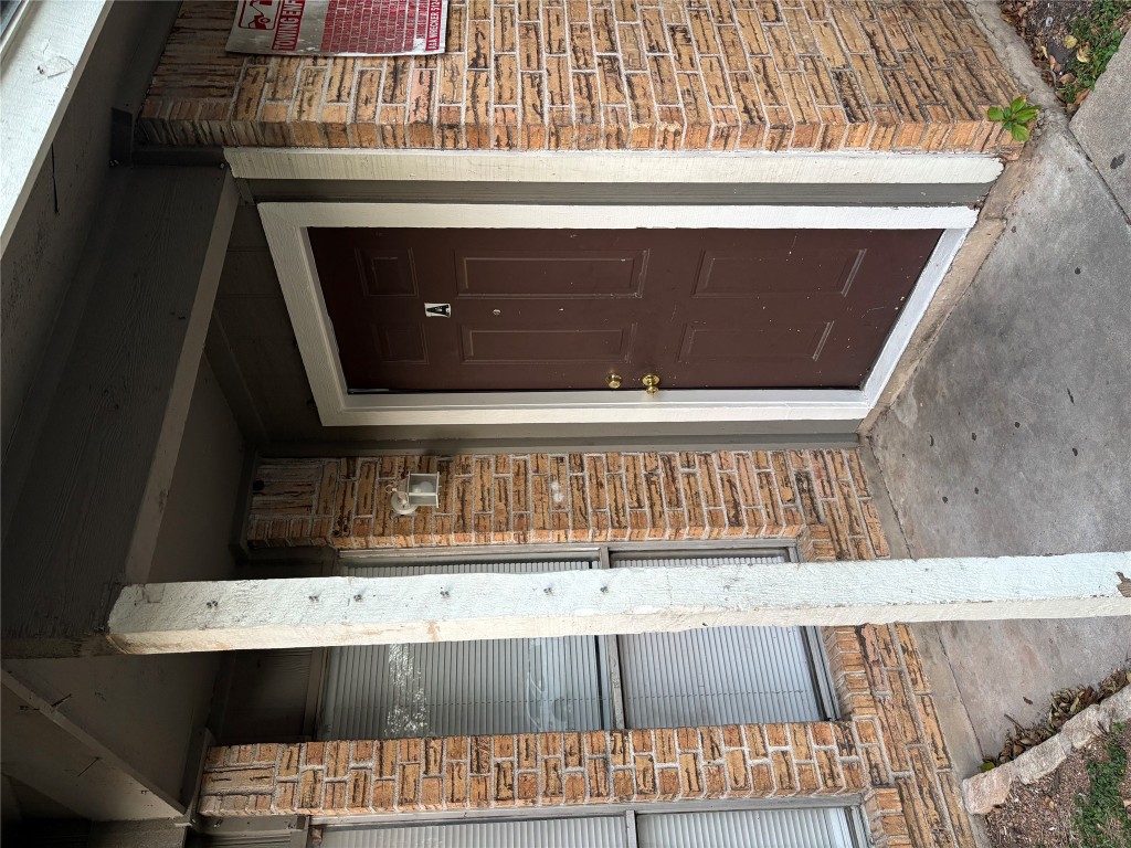 1210 Southport Drive, Unit A Austin, TX 78704 - Photo 2 of 15 a view of wooden door