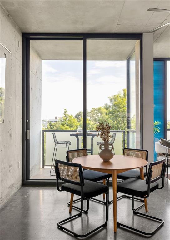 480 John Wesley Dobbs Avenue Northeast, Unit 612 Atlanta, GA 30312 - Photo 11 of 33 a view of a dining room with furniture window and outside view