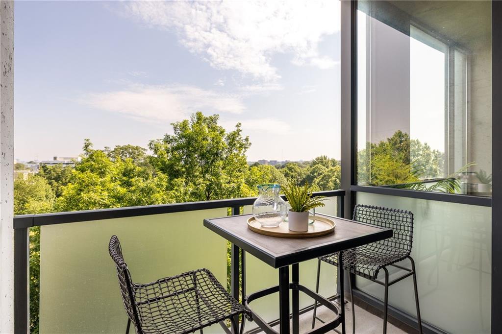 480 John Wesley Dobbs Avenue Northeast, Unit 612 Atlanta, GA 30312 - Photo 12 of 33 a view of a dining room with furniture window and outside view