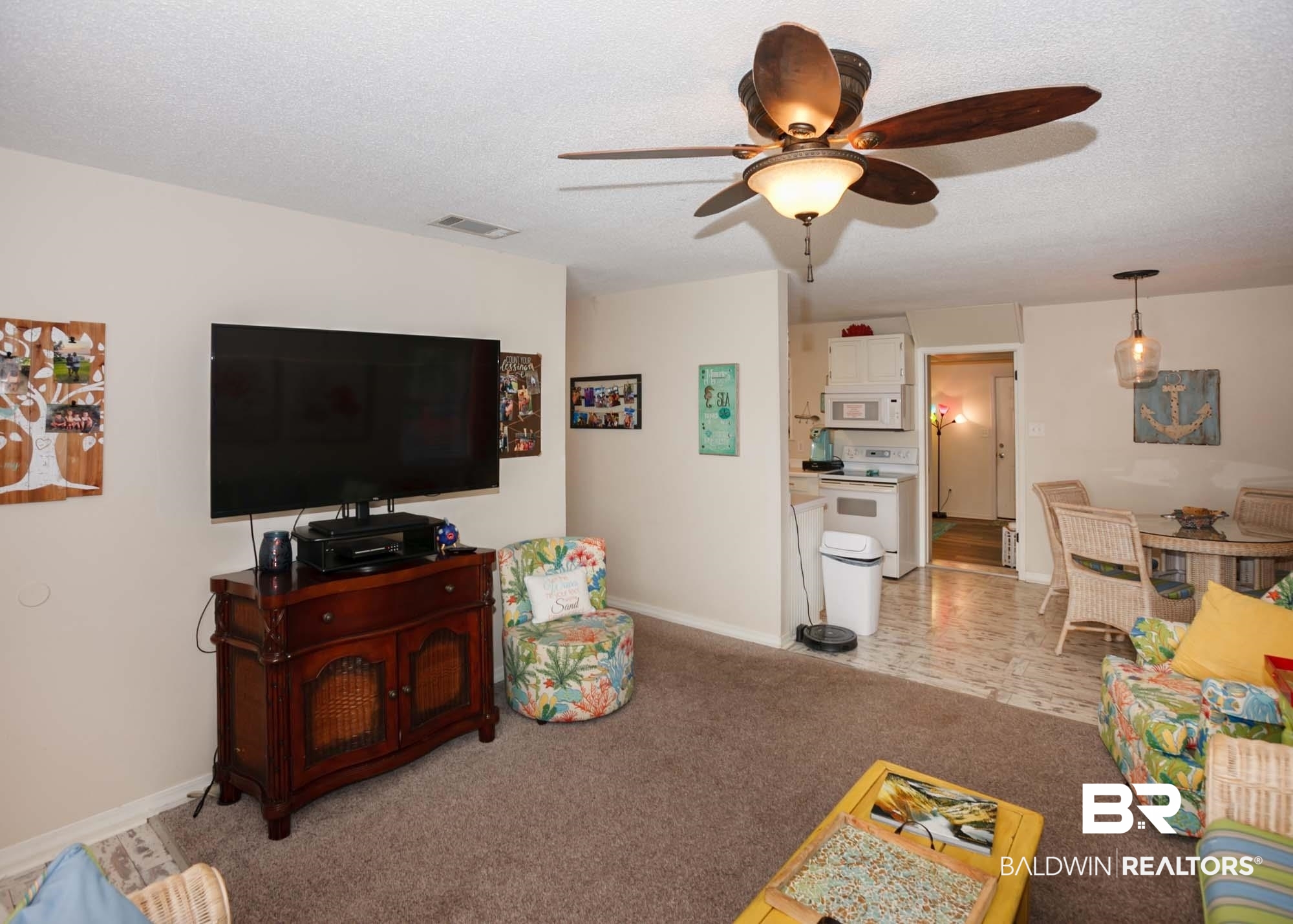 18753 County Road 12 Foley, AL 36535 - Photo 17 of 39 Living room with ceiling fan, light carpet, and a textured ceiling