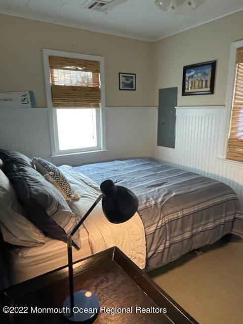 179 4th Avenue Manasquan, NJ 08736 - Photo 13 of 28 a bedroom with a bed and a window