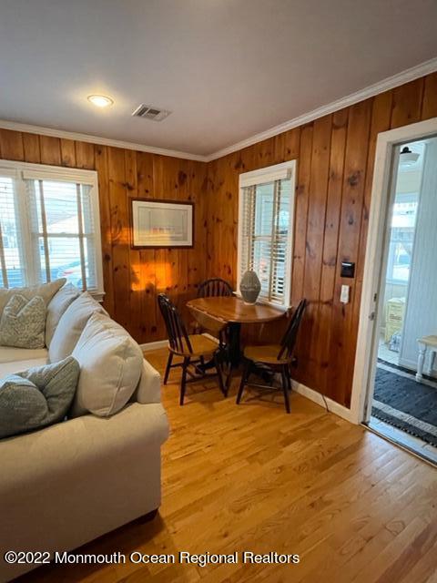 179 4th Avenue Manasquan, NJ 08736 - Photo 19 of 28 a living room with furniture a wooden floor and next to a window