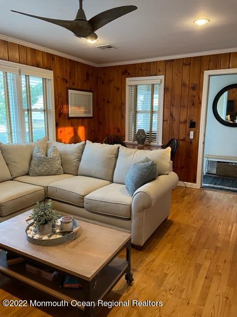179 4th Avenue Manasquan, NJ 08736 - Photo 22 of 28 a living room with furniture and a couch