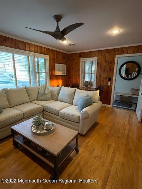 179 4th Avenue Manasquan, NJ 08736 - Photo 23 of 28 a living room with furniture a rug and a window