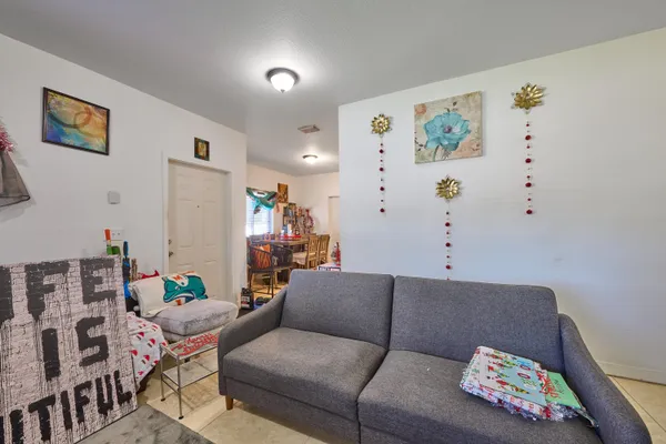 a living room with furniture and furniture