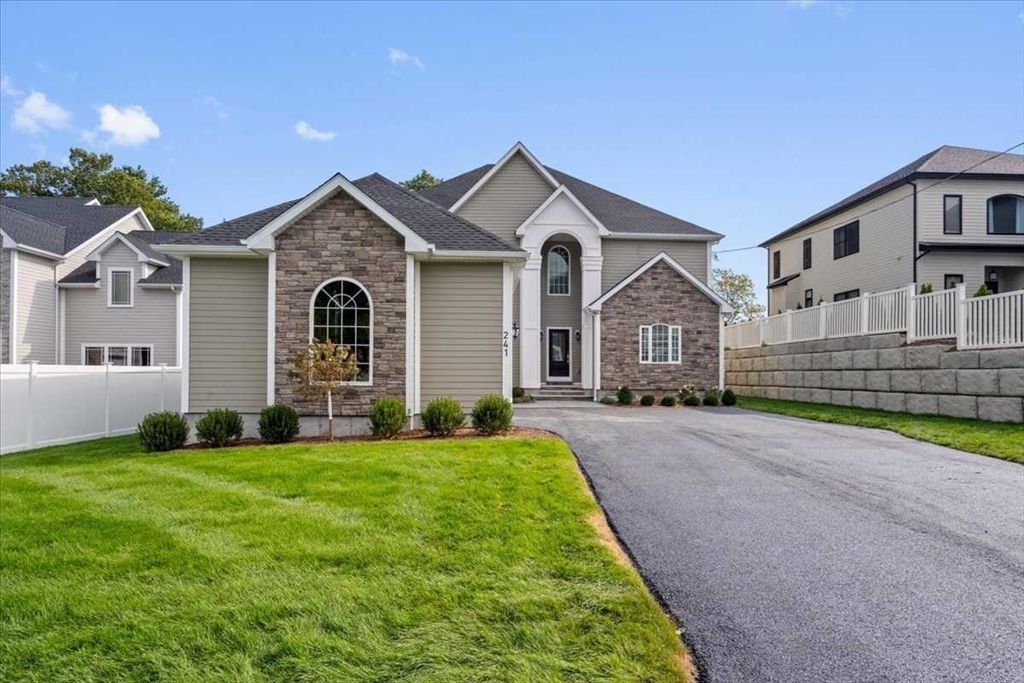 241 Lake Avenue Worcester, MA 01604 - Photo 2 of 42 a view of a brick house with a big yard and large trees