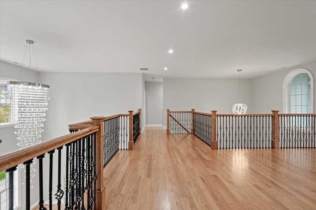 241 Lake Avenue Worcester, MA 01604 - Photo 26 of 42 a view of a hallway with wooden floor