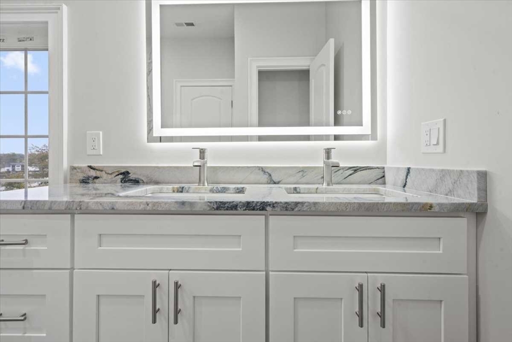241 Lake Avenue Worcester, MA 01604 - Photo 30 of 42 a bathroom with a sink and a mirror