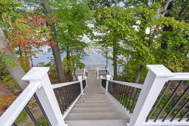a view of stairs and trees