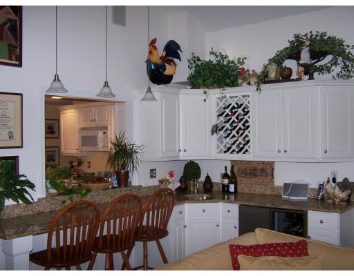 396 Hudson Road Stow, MA 01775 - Photo 4 of 12 a kitchen with a sink and cabinets