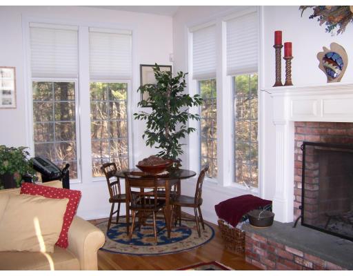 396 Hudson Road Stow, MA 01775 - Photo 10 of 12 a view of a dining room with furniture window and wooden floor