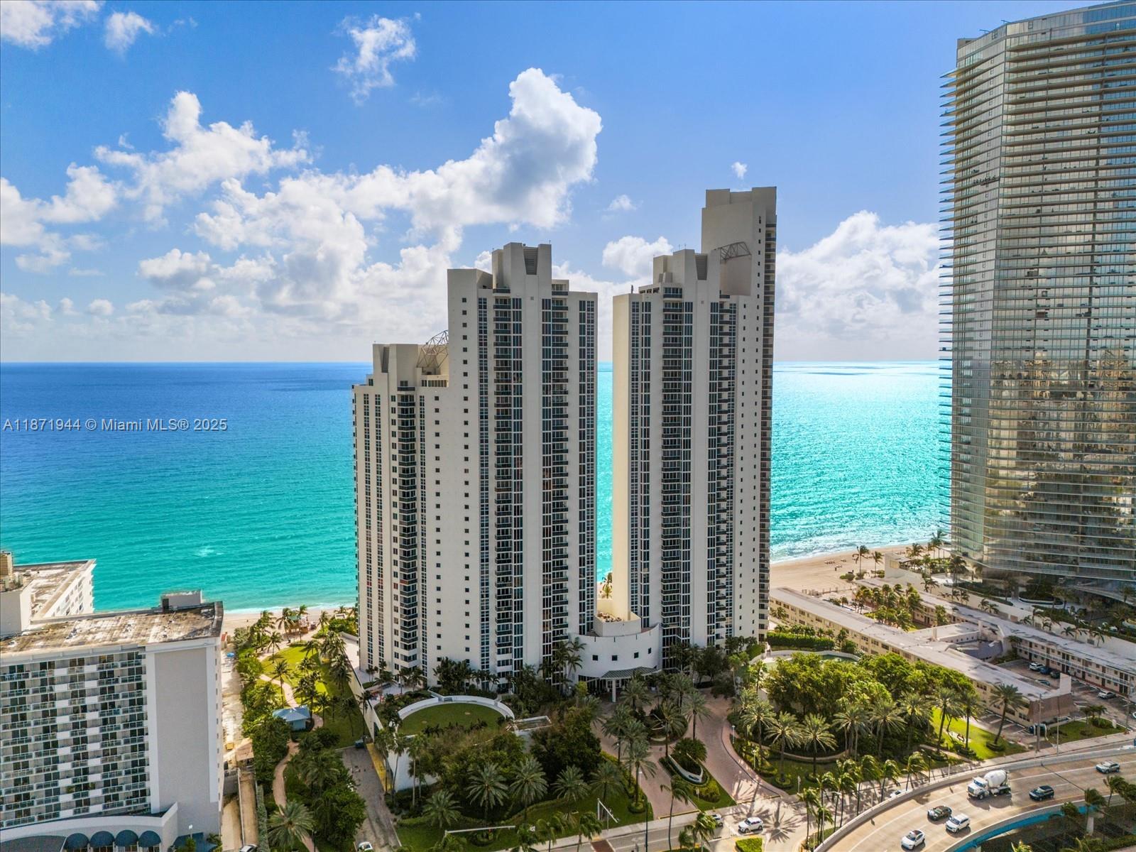 19111 Collins Avenue, Unit 1406 Sunny Isles Beach, FL 33160 - Photo 2 of 40 a view of a city with tall buildings