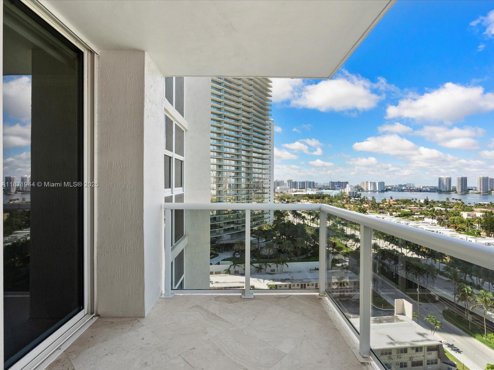 19111 Collins Avenue, Unit 1406 Sunny Isles Beach, FL 33160 - Photo 34 of 40 a view of a balcony with city view