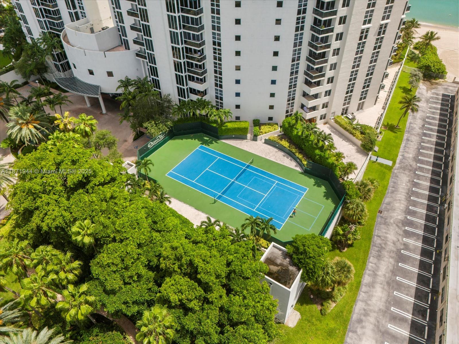 19111 Collins Avenue, Unit 1406 Sunny Isles Beach, FL 33160 - Photo 37 of 40 an aerial view of a pool