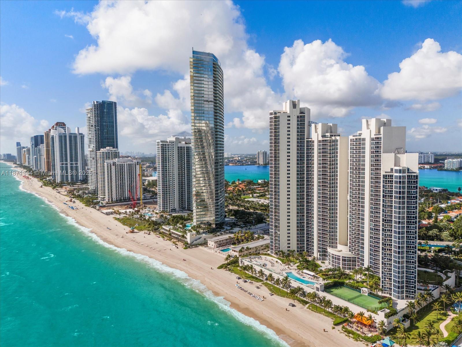 19111 Collins Avenue, Unit 1406 Sunny Isles Beach, FL 33160 - Photo 39 of 40 a view of a city with tall buildings