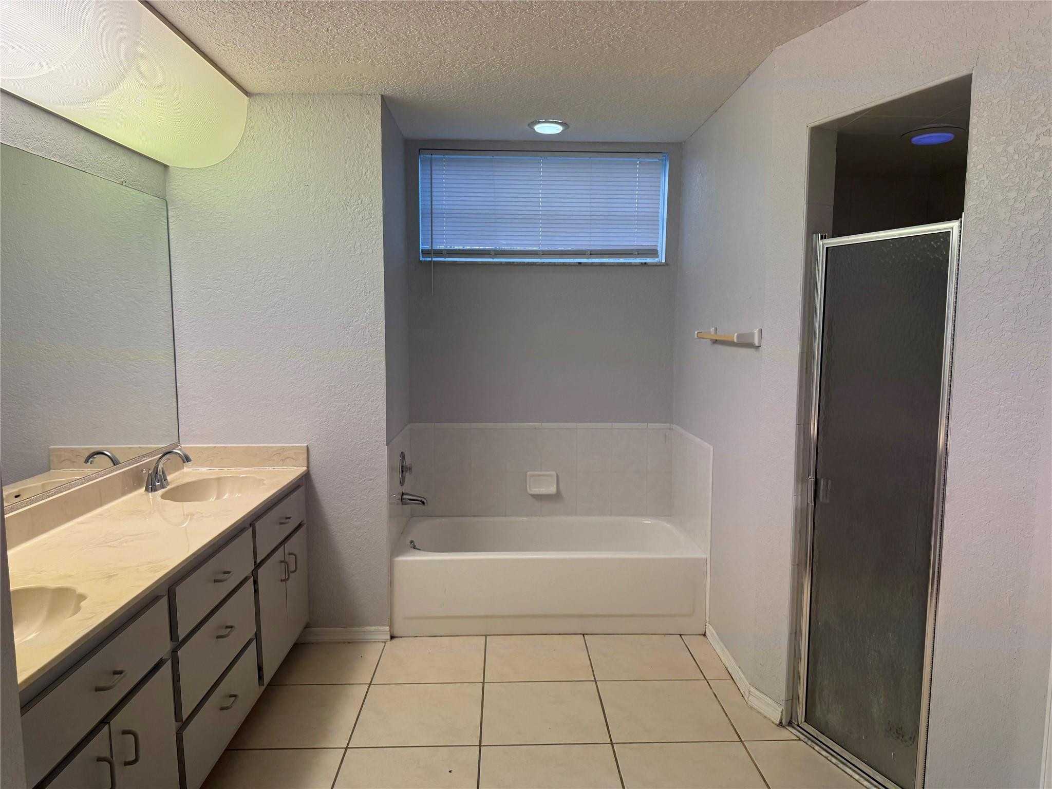 529 Guild Street Port Charlotte, FL 33954 - Photo 20 of 41 a bathroom with a tub sink and mirror