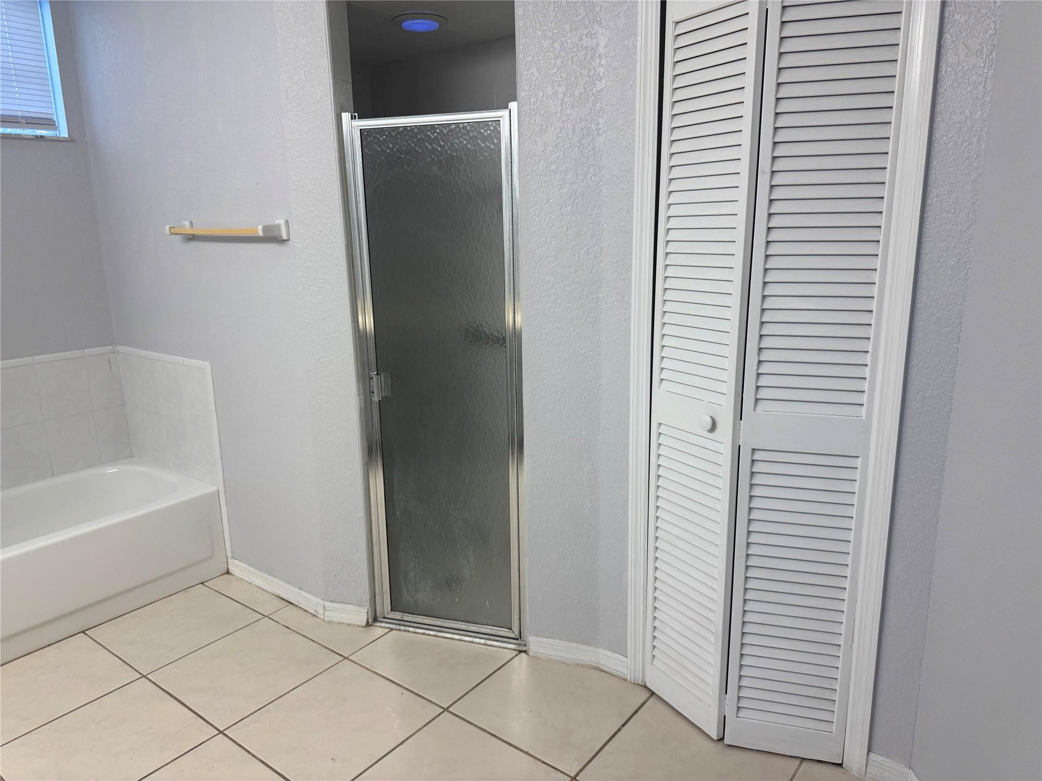 529 Guild Street Port Charlotte, FL 33954 - Photo 21 of 41 a bathroom with a bathtub