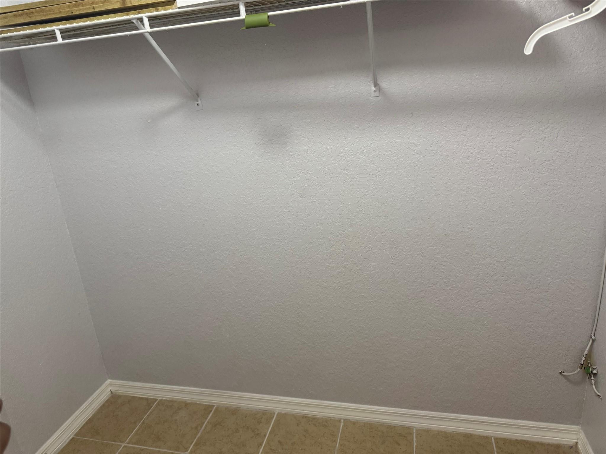 529 Guild Street Port Charlotte, FL 33954 - Photo 24 of 41 a view of a room with racks on the wall