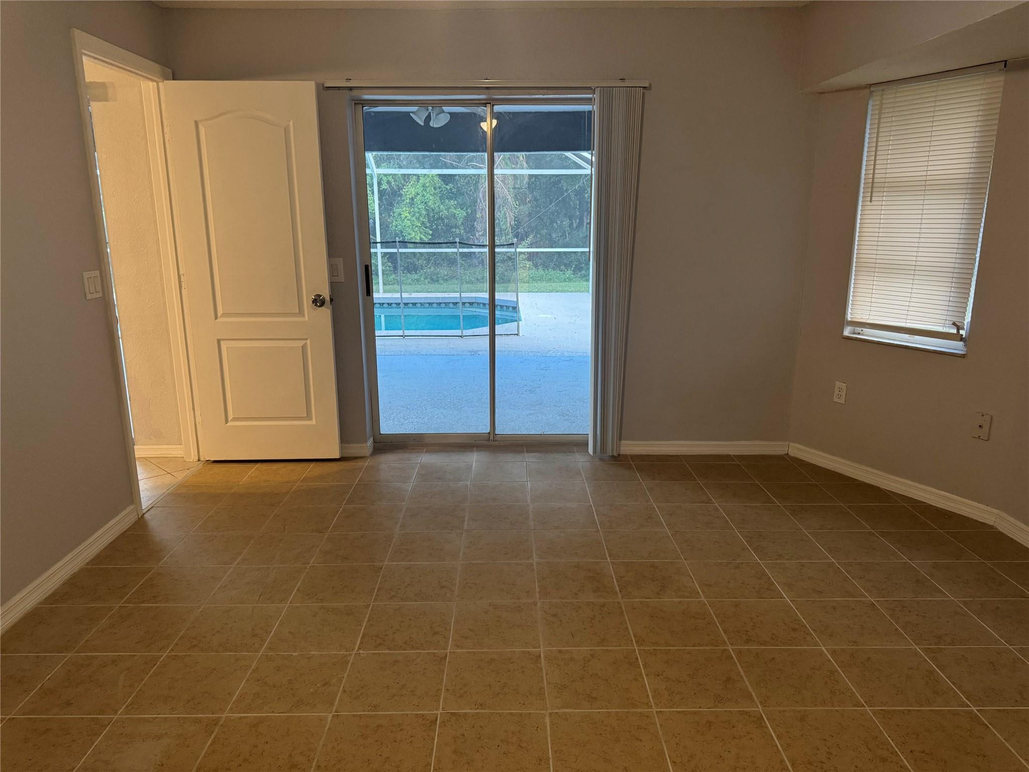 529 Guild Street Port Charlotte, FL 33954 - Photo 31 of 41 a view of an empty room with a window