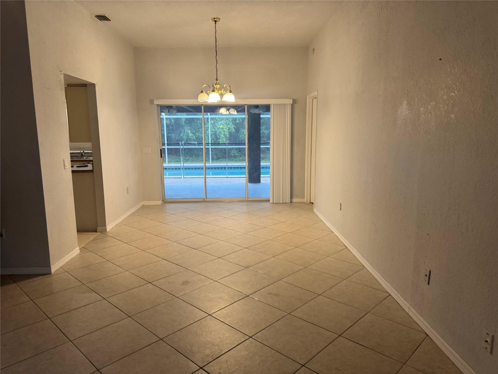 529 Guild Street Port Charlotte, FL 33954 - Photo 34 of 41 an empty room with windows