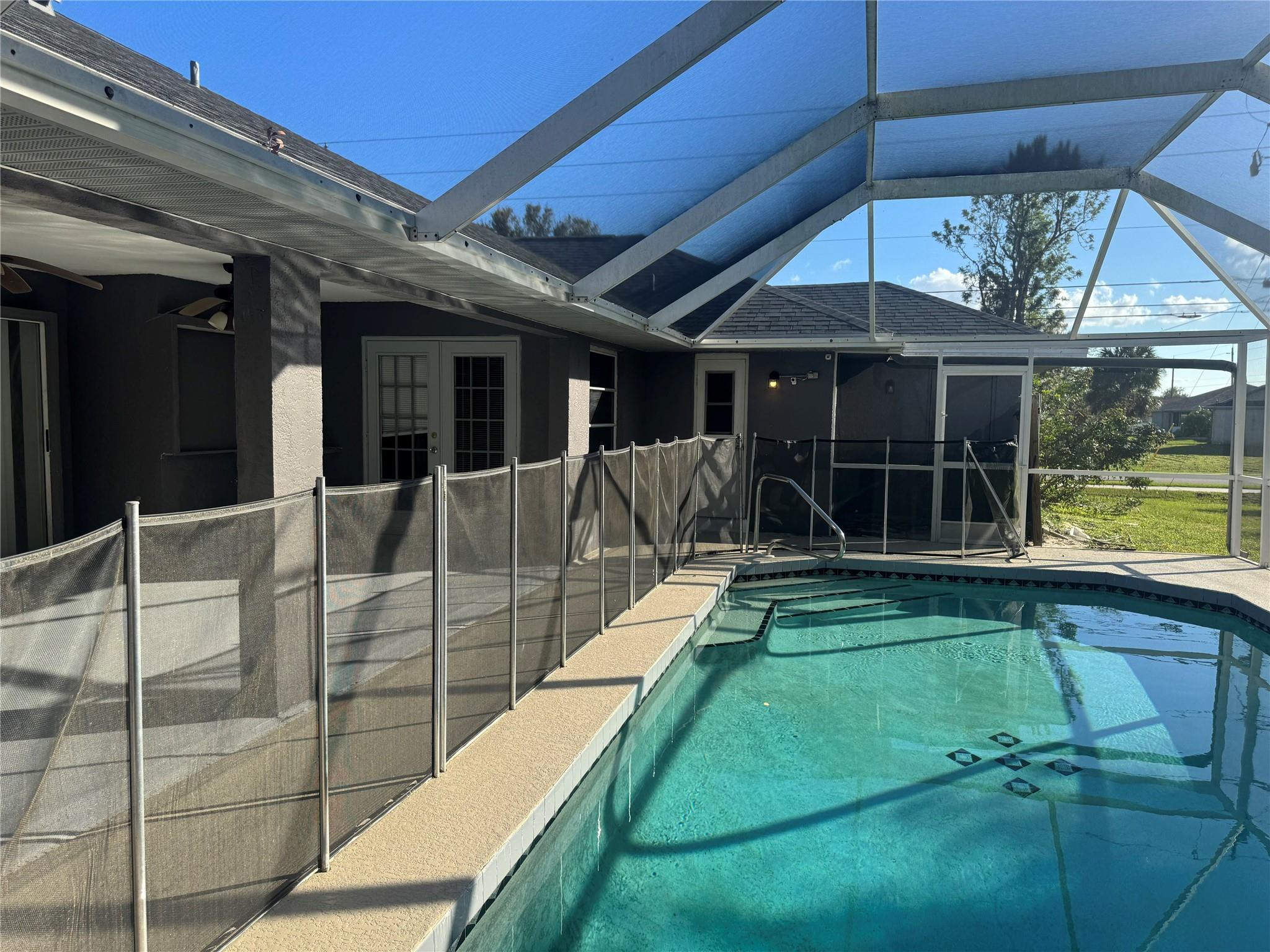 529 Guild Street Port Charlotte, FL 33954 - Photo 4 of 41 a view of a backyard with a patio