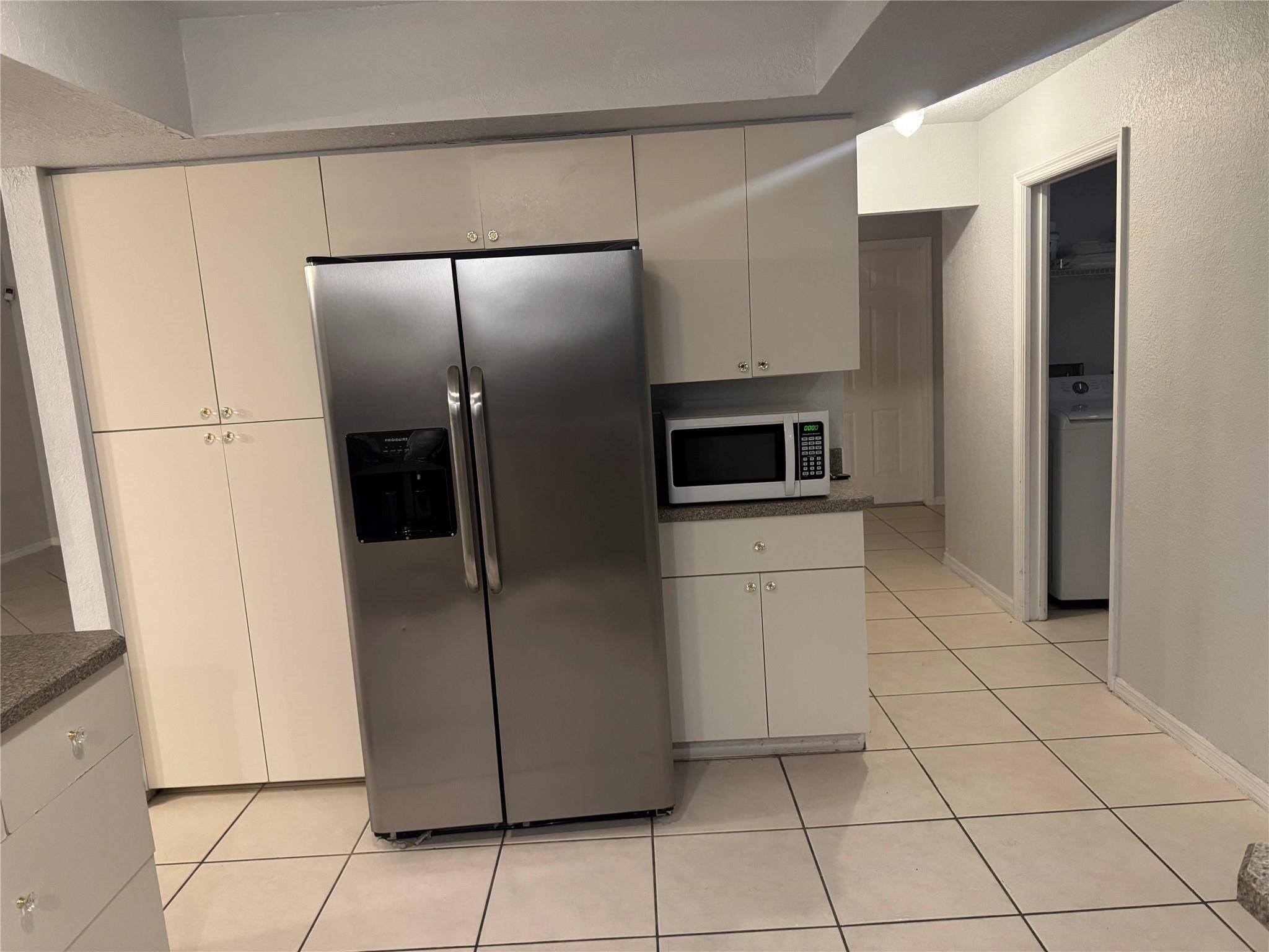 529 Guild Street Port Charlotte, FL 33954 - Photo 41 of 41 a kitchen with stainless steel appliances a refrigerator and cabinets