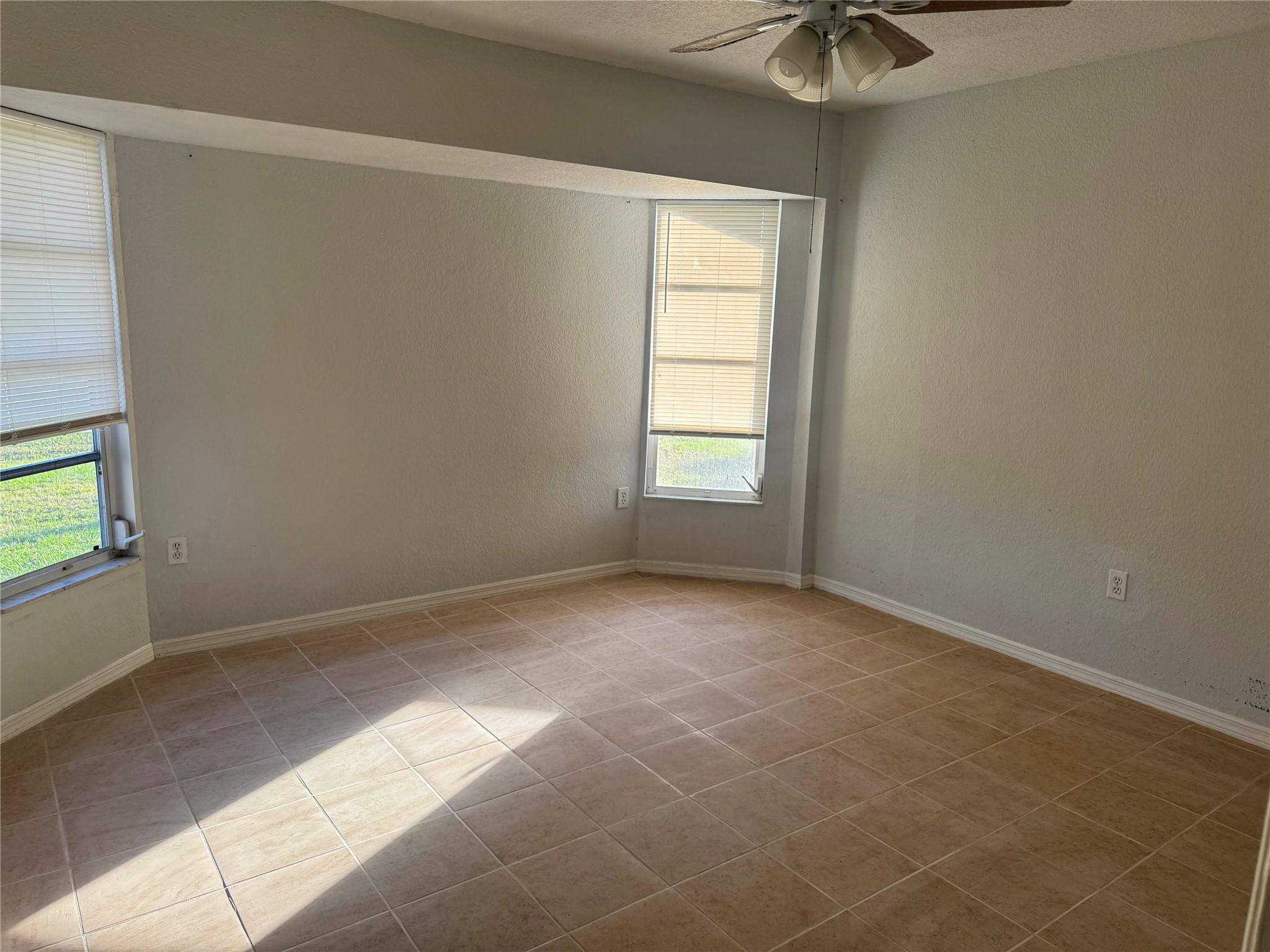 529 Guild Street Port Charlotte, FL 33954 - Photo 9 of 41 an empty room with a window