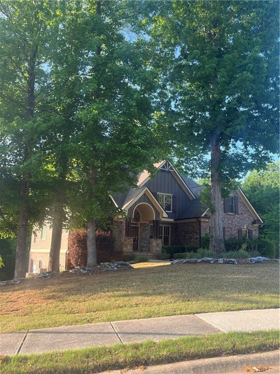 348 Hidden Trail Pendergrass, GA 30567 - Photo 4 of 40 a house view with a outdoor space