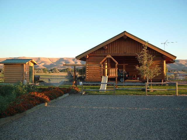 155512 West Johnson Road Prosser, WA 99350 - Photo 2 of 6 a view of backyard with swimming pool and outdoor seating