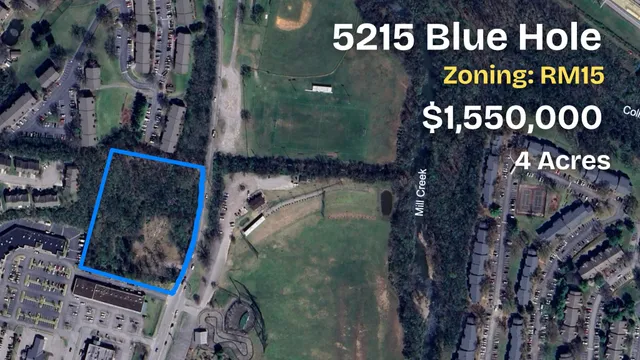 a street sign on a brick wall