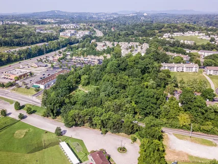 an aerial view of a city with lots of residential buildings