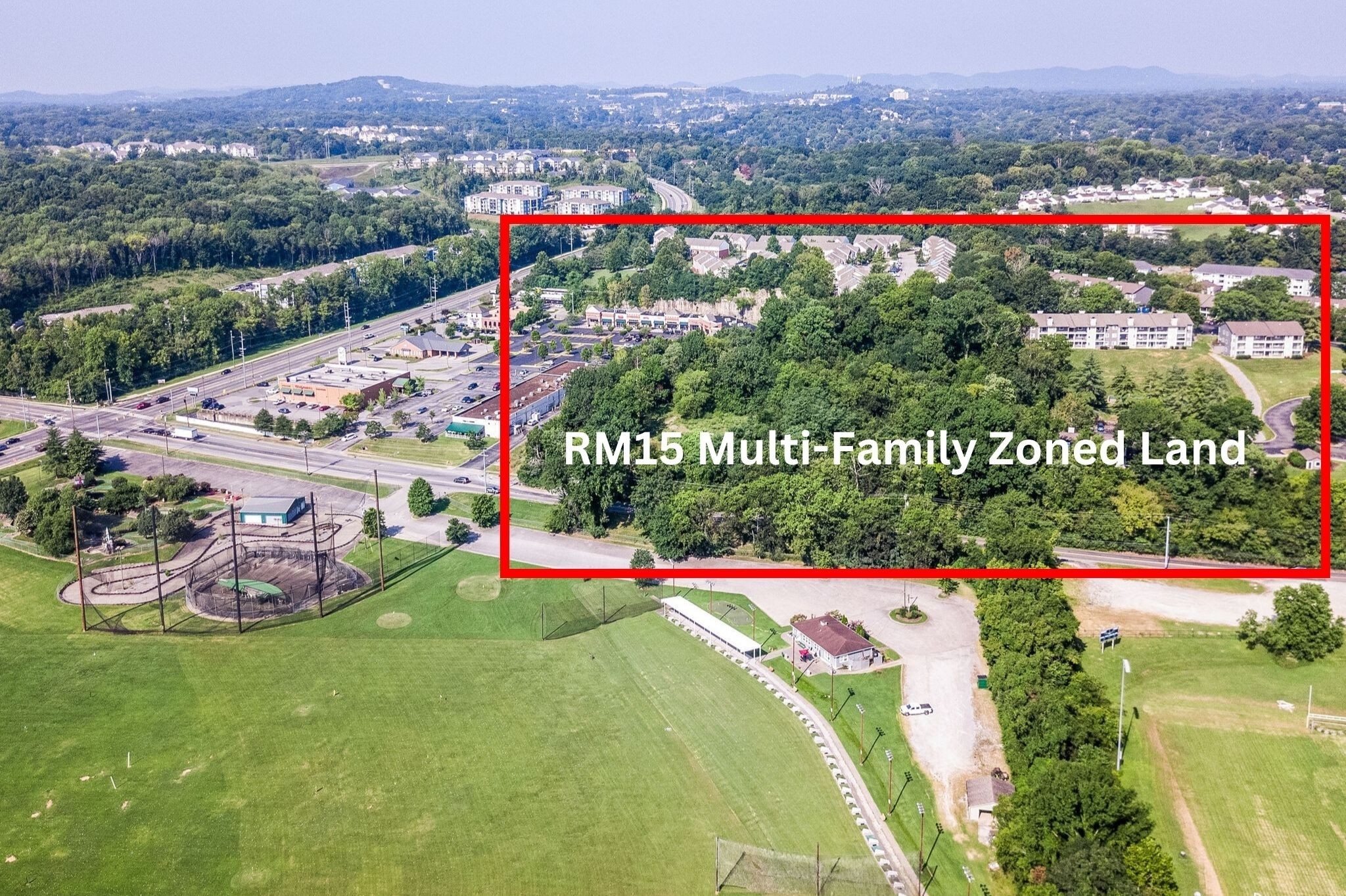 5215 Blue Hole Road Antioch, TN 37013 - Photo 2 of 18 a view of a lush green field with some trees in the background