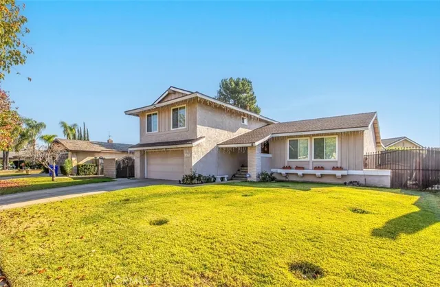 a view of a house with swimming pool