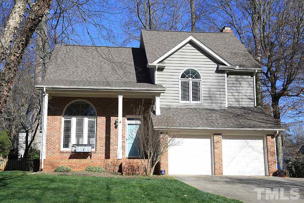 4100 Stemmons Court Raleigh, NC 27613 - Photo 1 of 13 a front view of a house with a yard