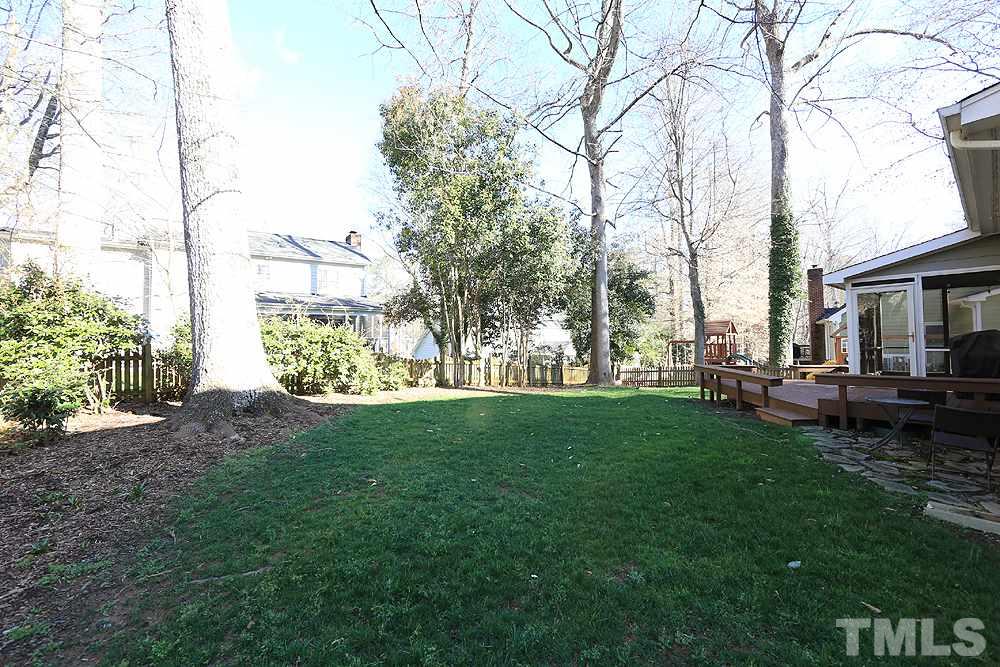 4100 Stemmons Court Raleigh, NC 27613 - Photo 13 of 13 a view of backyard of house with green space