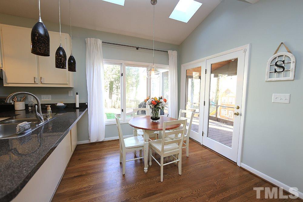 4100 Stemmons Court Raleigh, NC 27613 - Photo 5 of 13 a dining room with furniture window wooden floor