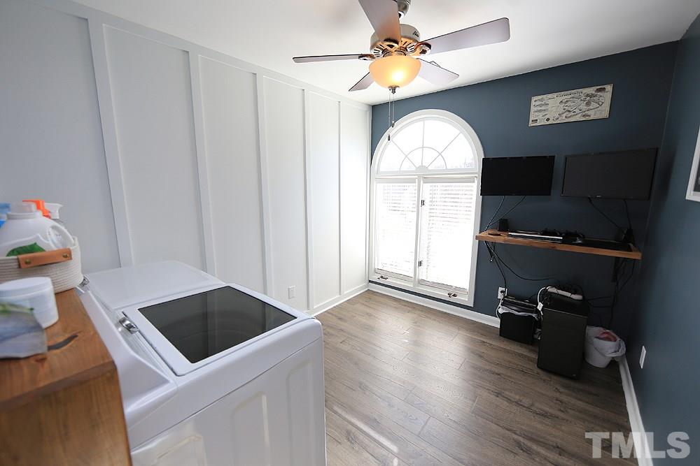 4100 Stemmons Court Raleigh, NC 27613 - Photo 10 of 13 a view of kitchen with wooden floor and window