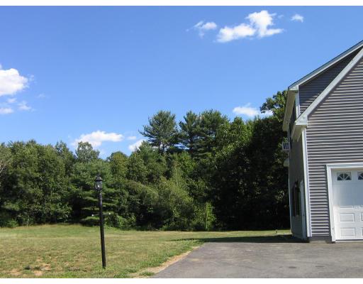48 Danville Road Kingston, NH 03848 - Photo 4 of 12 a view of a yard with an outdoor space