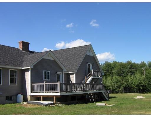 48 Danville Road Kingston, NH 03848 - Photo 5 of 12 a front view of a house with a yard