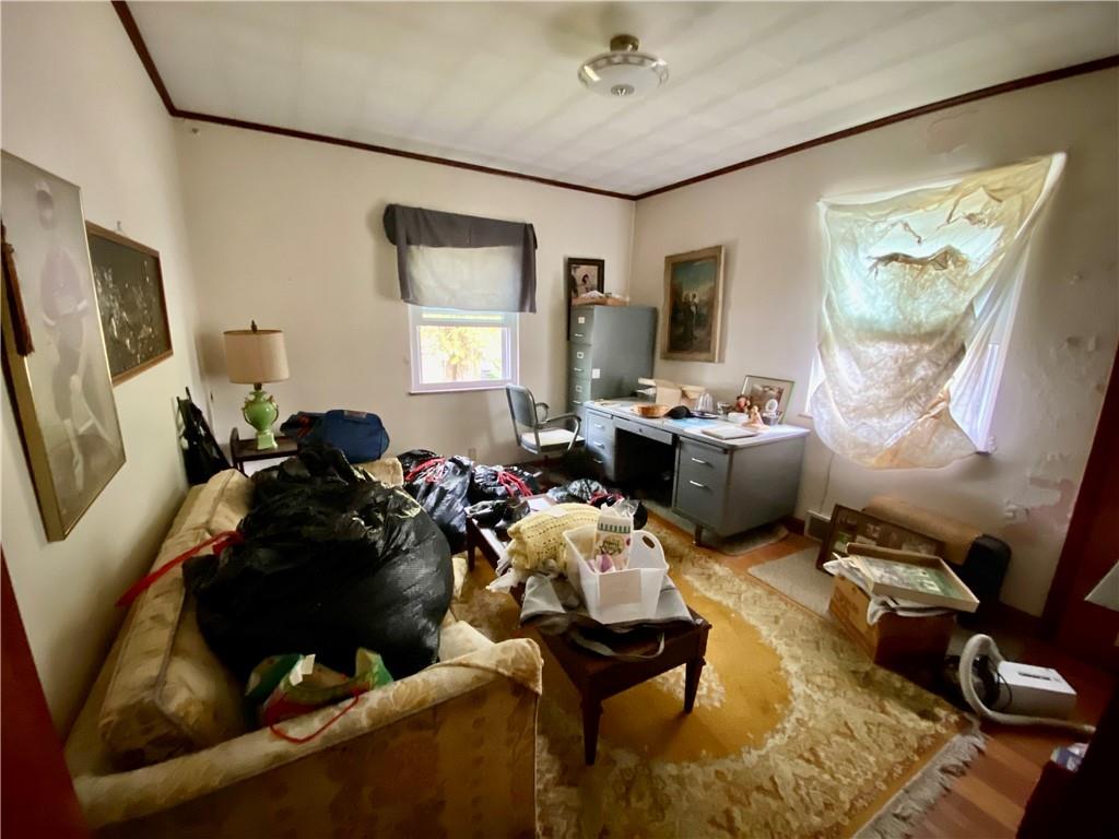 1590 Old Brodhead Road Monaca, PA 15061 - Photo 12 of 29 a living room with furniture a flat screen tv and a window