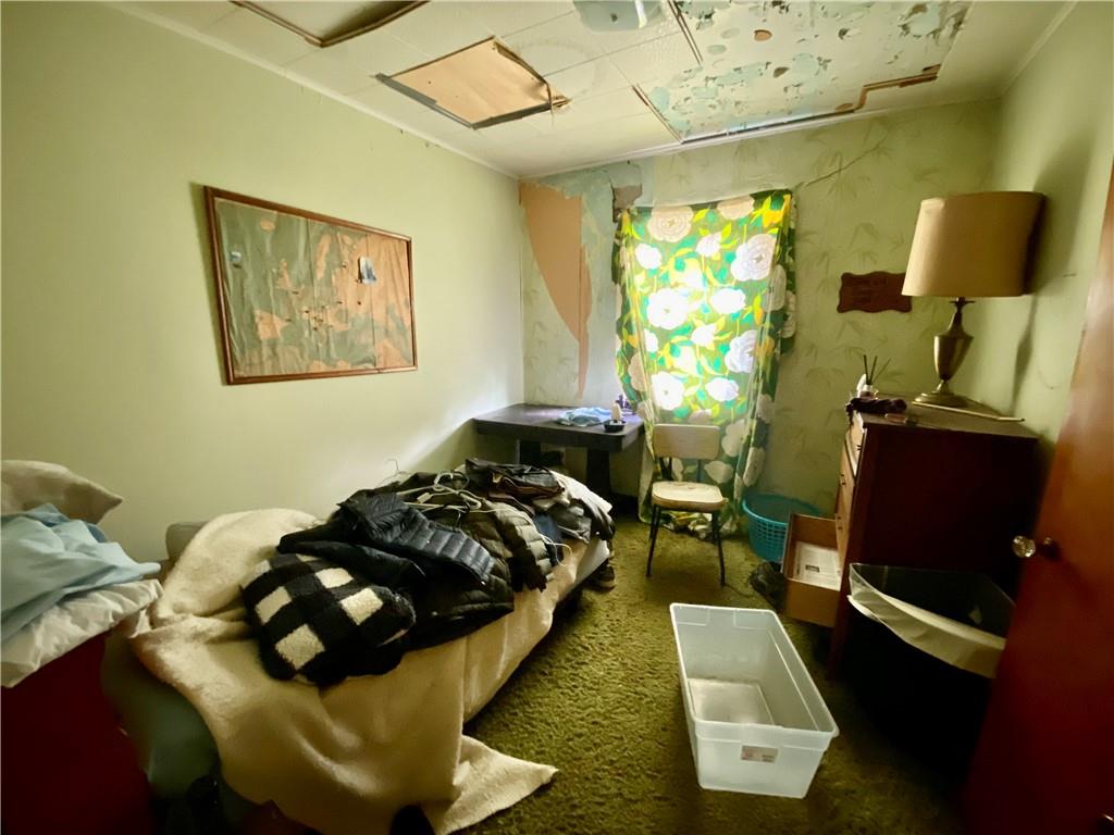 1590 Old Brodhead Road Monaca, PA 15061 - Photo 13 of 29 a bedroom with a bed and wooden floor