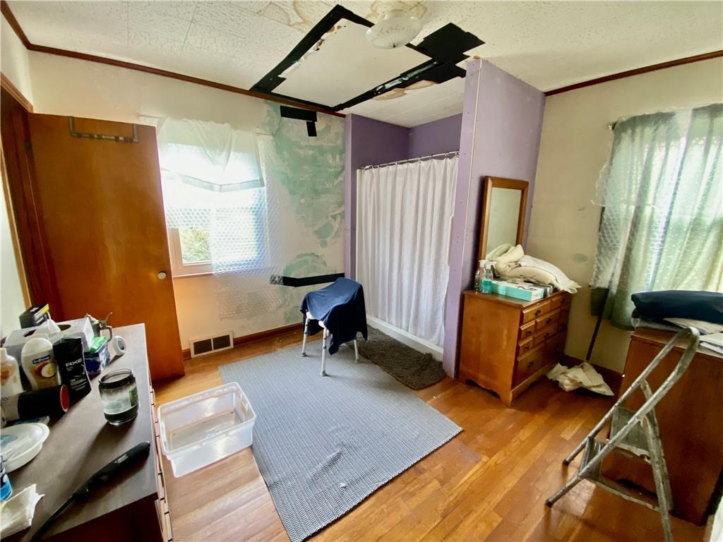 1590 Old Brodhead Road Monaca, PA 15061 - Photo 14 of 29 a living room with furniture and a window