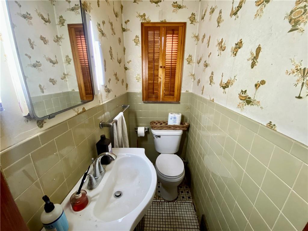 1590 Old Brodhead Road Monaca, PA 15061 - Photo 15 of 29 a bathroom with a sink and a mirror